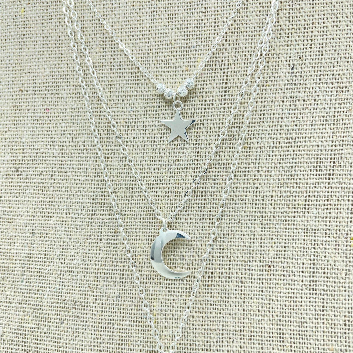 Trio Universo. Estrella, Luna, Planeta y Cadena de Plata.