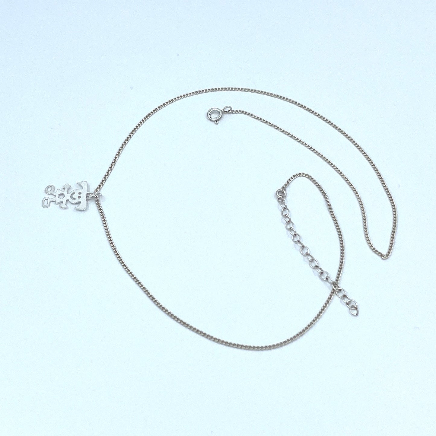 Collar de Plata con dije de Niña.
