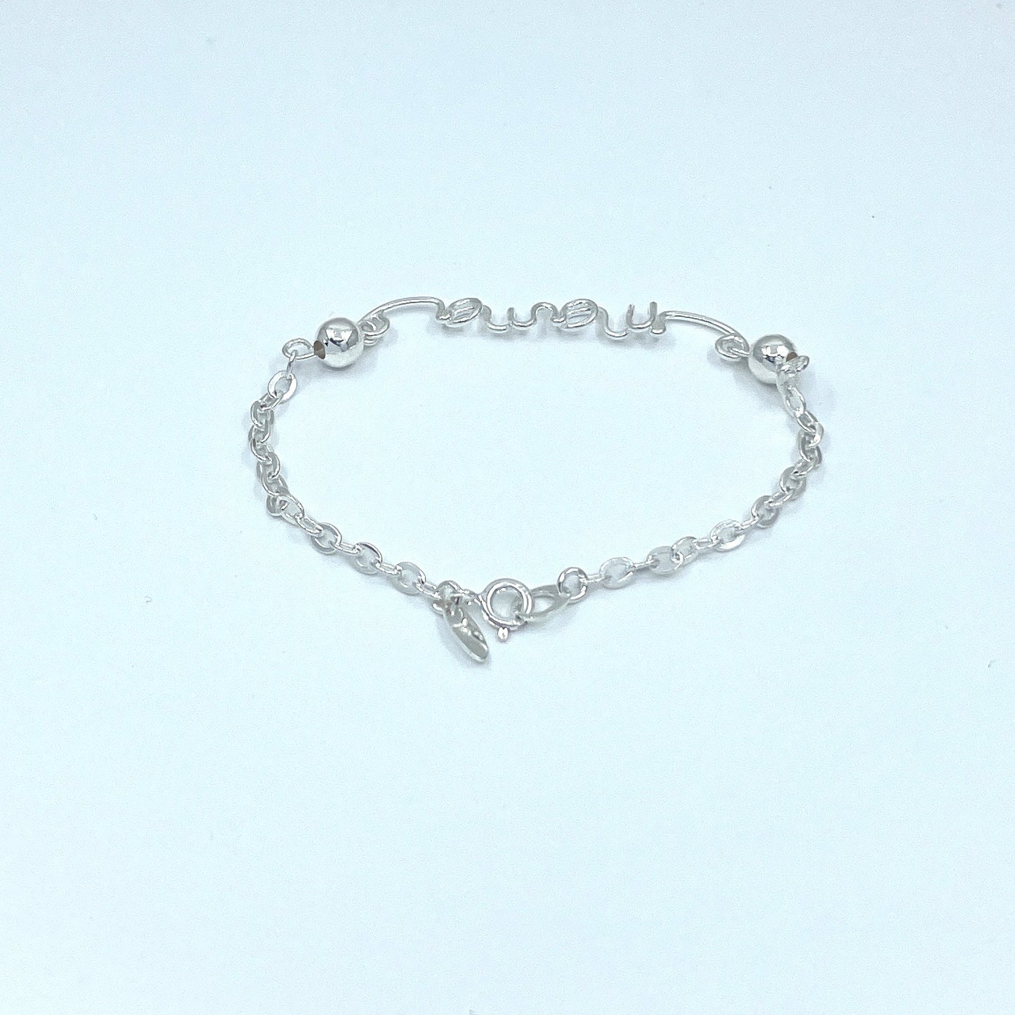 Pulsera de Plata con palabra MAMÁ.