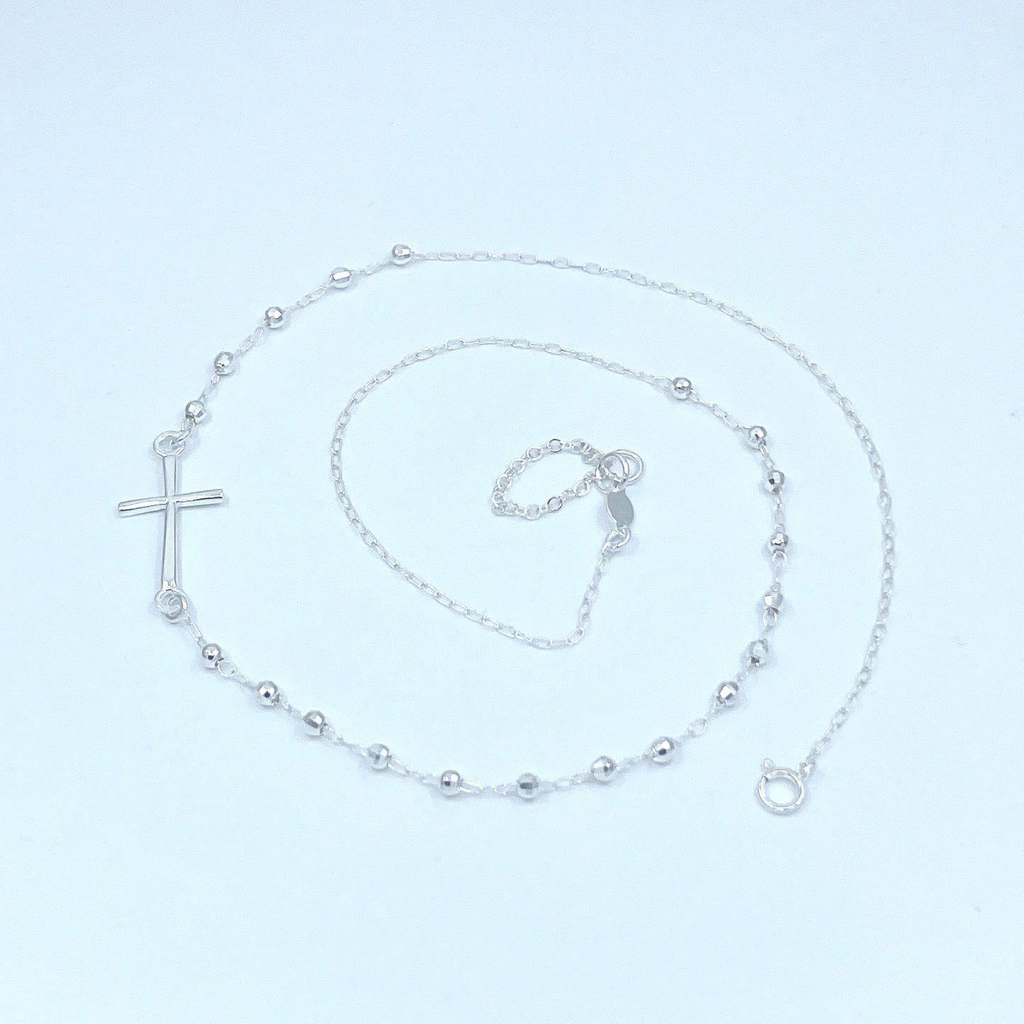 Collar de Plata con Cruz.