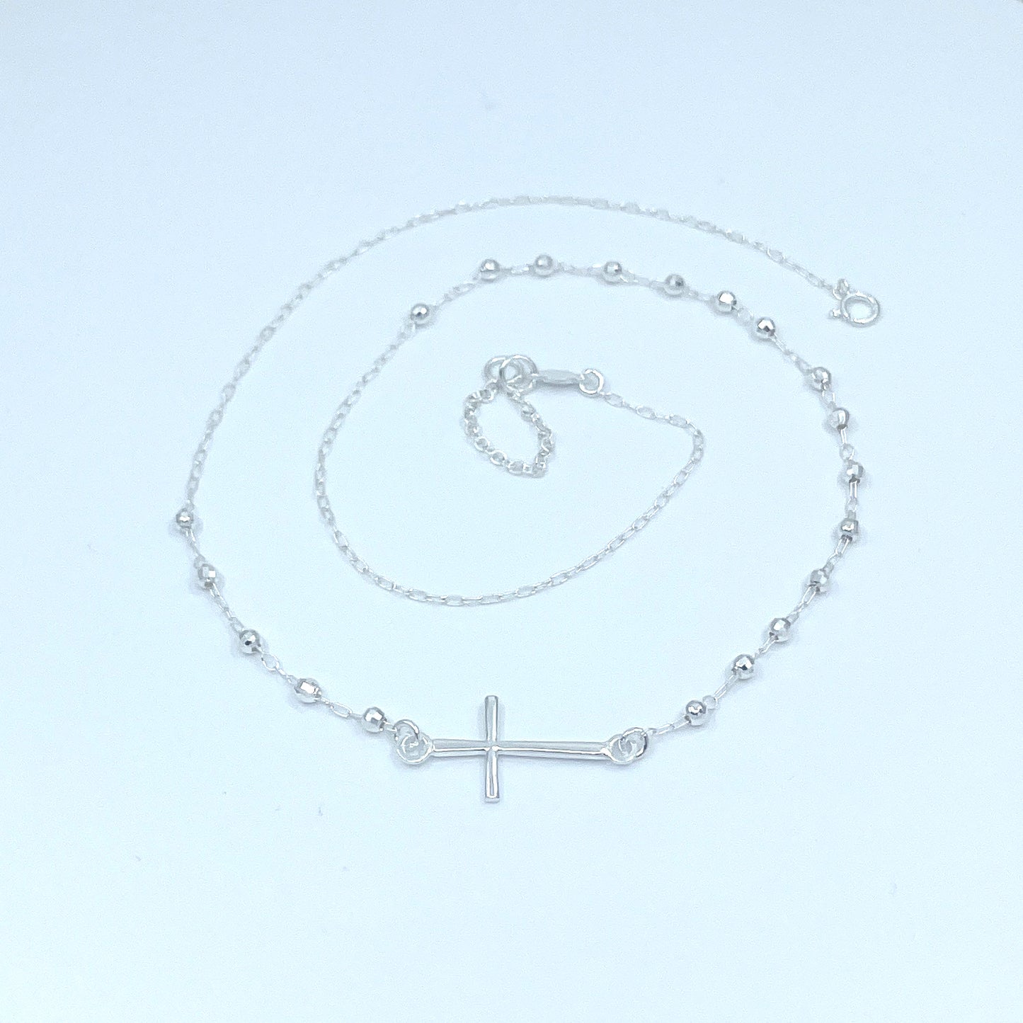Collar de Plata con Cruz.