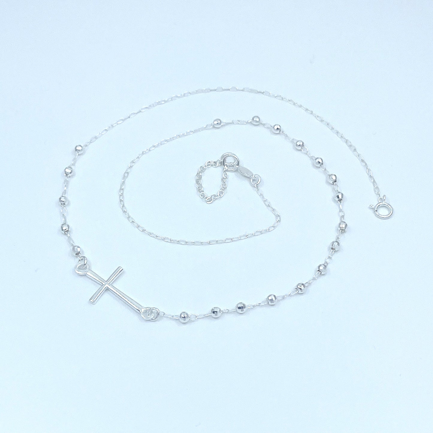 Collar de Plata con Cruz.