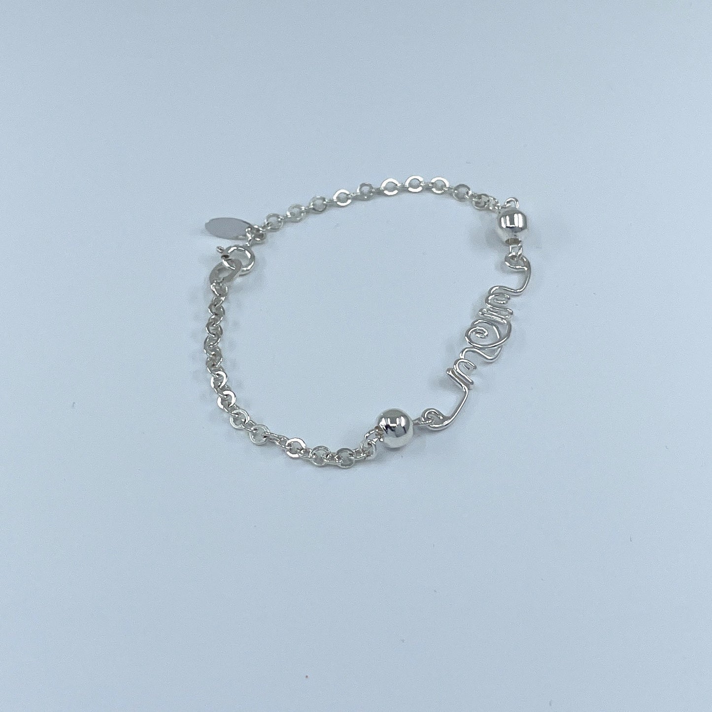 Pulsera de Plata con palabra MOM.